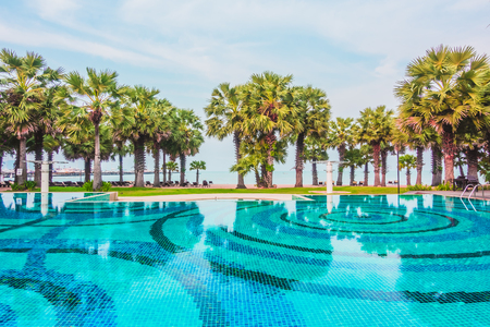 Beautiful luxury swimming pool in hotel pool resort - Vintage Light Filterの写真素材