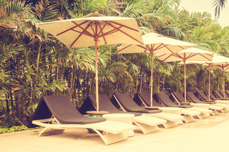 Beautiful luxury vintage swimming pool in hotel pool resort - Vintage Filterの写真素材