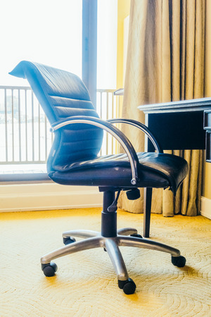 Empty working table and chair decoration in bedroom interior - Vintage Light Filterの写真素材