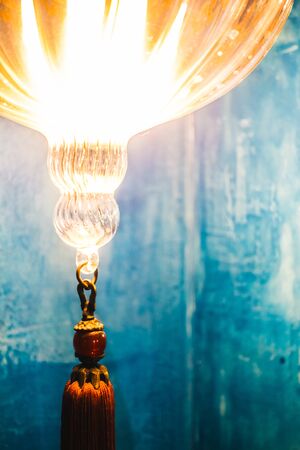 Selective focus point on Morocco light lantern decoration in living room interior - Vintage Light Filterの写真素材
