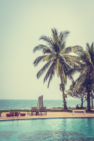 Beautiful luxury outdoor swimming pool in hotel resort - Vintage Filter and Boost up color Processingのeditorial素材