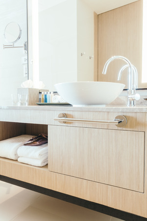 Beautiful luxury sink decoration in bathroom interior for background - Vintage Light filterの写真素材