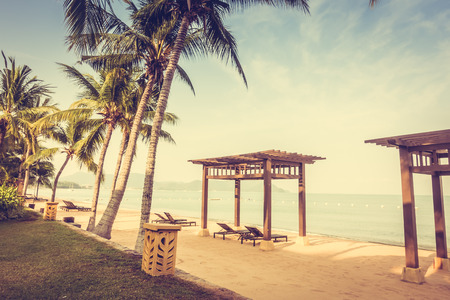 Beautiful beach and sea with empty chair on tropical beach - Filter effect and boost up color Processingの写真素材