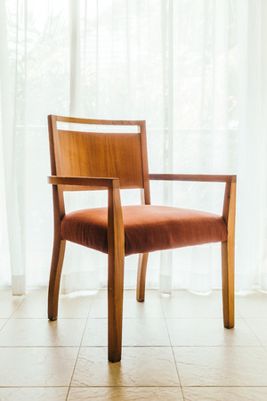 Empty chair and table around outdoor deck - Vintage Light Filterの写真素材