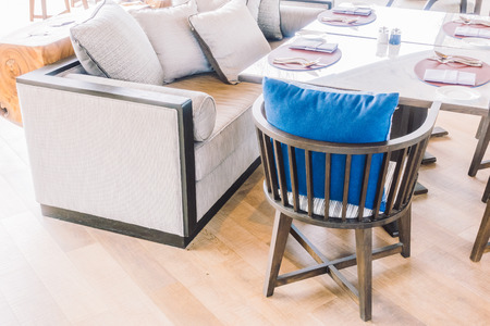 Empty chair and table setting for dinning in restaurant - Vintage Light Filterの写真素材