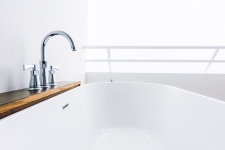 Beautiful luxury white modern bathtub decoration in bathroom interior - Filter effectの写真素材