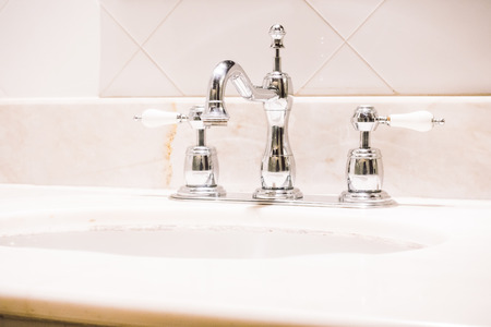 Faucet decoration in bathroom interior - Vintage Light Filterの写真素材