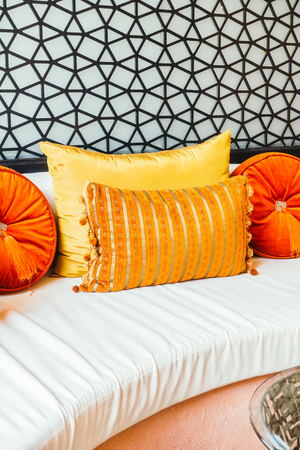 Beautiful luxury pillow on sofa decoration in living room interior - Vintage Light Filterの写真素材