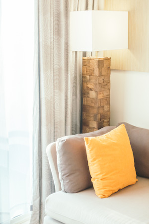 Pillow on sofa decoration interior of living room - Vintage Light filterの写真素材