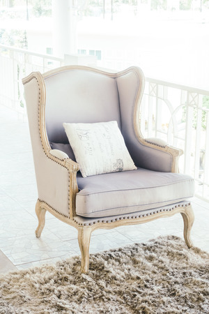 Beautiful luxury Pillow on sofa decoration in living room interior - Vintage light Filterの写真素材
