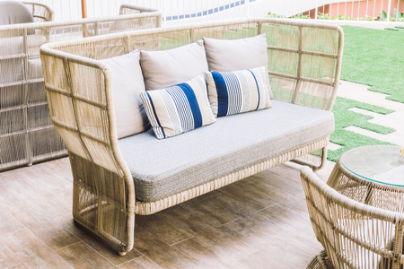 Pillow on sofa decoration in living room interior - Vintage Light Filterの写真素材