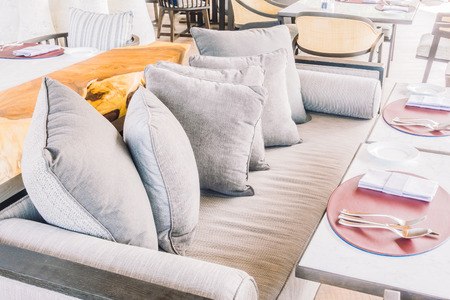 Empty chair and table setting for dinning in restaurant - Vintage Light Filterの写真素材