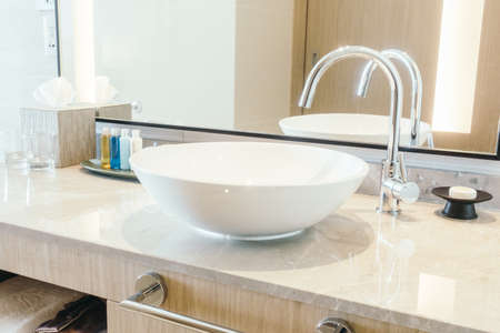 Beautiful luxury sink decoration in bathroom interior for background - Vintage Light filterの写真素材