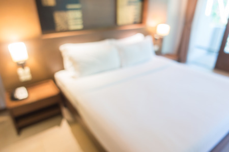 Abstract blur beautiful luxury bedroom interior for backgroundの写真素材