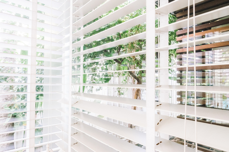 Selective focus point on Blinds window decoration in livingroom interior - Vintage Light Filterの写真素材