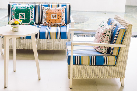 Beautiful luxury pillow on sofa decoration in living room interior - Vintage Light Filterの写真素材