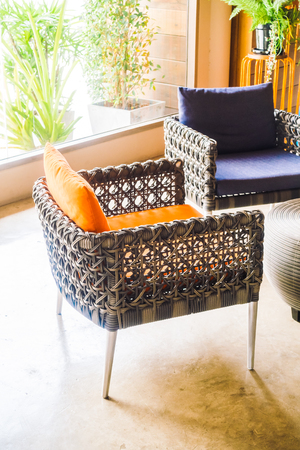 Beautiful luxury pillow on sofa decoration in living room interior - Vintage light Filterの写真素材