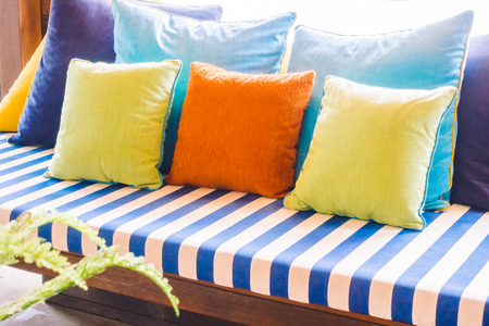 Beautiful luxury pillow on sofa decoration in living room interior - Vintage light Filterの写真素材