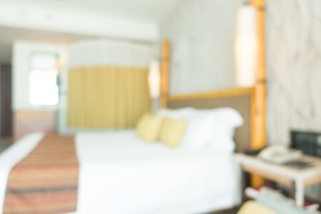 Abstract blur Beautiful pillow on luxury bed in bedroom interior - Vintage Light Filterの写真素材