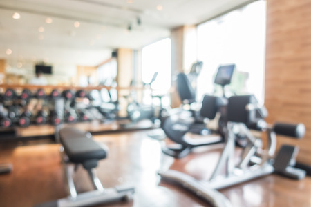 Abstract blur gym and fitness room interior for background