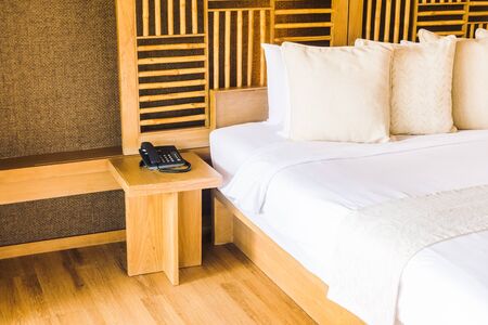 Beautiful luxury pillow on bed decoration in bedroom interior - Vintage light Filterの写真素材