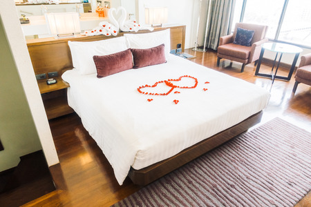 Beautiful luxury pillow on bed decoration in bedroom area - Vintage light Filterのeditorial素材