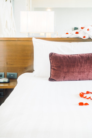 Beautiful luxury pillow on bed decoration in bedroom area - Vintage light Filterの写真素材