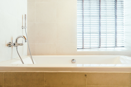 White bathtub decoration in bathroom  and toilet room interior - Vintage light Filterの写真素材