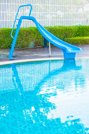 Pool slide around outdoor swimming pool in hotel resortのeditorial素材