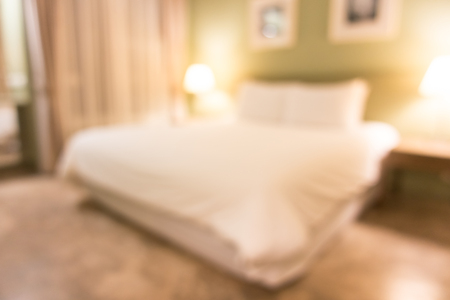 Abstract blur beautiful luxury bedroom interior for backgroundの写真素材