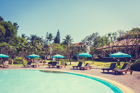 Outdoor Swimming pool in hotel resort - Vintage Filterのeditorial素材