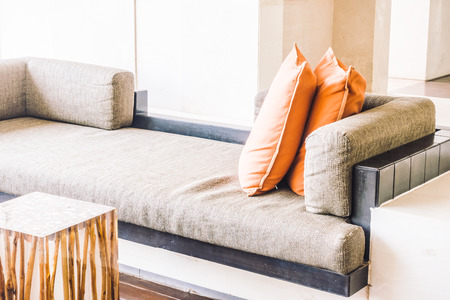 Beautiful luxury and comfort pillow on sofa decoration in living room interior - Vintage light Filterの写真素材