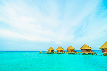 Beautiful tropical Maldives island with beach and sea for nature holiday vacation background concept -Boost up color Processingの写真素材