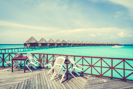 Beautiful tropical Maldives resort hotel and island with beach and sea on sky for holiday vacation background concept -Boost up color Processingのeditorial素材