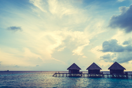 Beautiful tropical Maldives resort hotel and island with beach and sea on sky for holiday vacation background concept -Boost up color Processingのeditorial素材