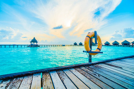 Beautiful tropical Maldives resort hotel and island with beach and sea on sky for holiday vacation background concept -Boost up color Processingのeditorial素材
