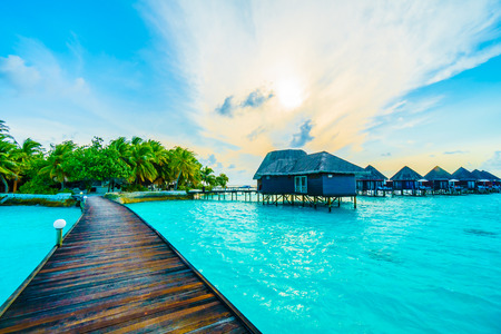 Beautiful tropical Maldives resort hotel and island with beach and sea on sky for holiday vacation background concept -Boost up color Processingのeditorial素材