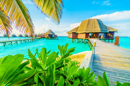 Beautiful tropical Maldives resort hotel and island with beach and sea on sky for holiday vacation background concept -Boost up color Processingのeditorial素材