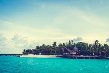 Beautiful tropical Maldives resort hotel and island with beach and sea on sky for holiday vacation background concept -Boost up color Processingのeditorial素材