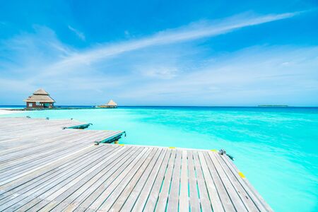 Beautiful tropical Maldives resort hotel and island with beach and sea on sky for holiday vacation background concept - Boost up color Processingのeditorial素材