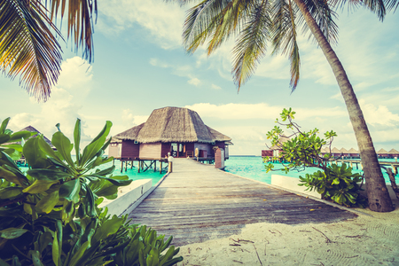 Beautiful tropical Maldives resort hotel and island with beach and sea on sky for holiday vacation background concept -Boost up color Processingのeditorial素材