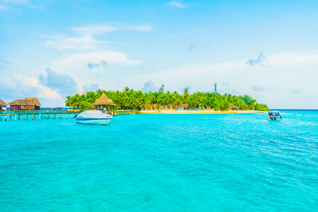 Beautiful tropical Maldives resort hotel and island with beach and sea on sky for holiday vacation background concept -Boost up color Processingのeditorial素材