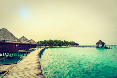 Beautiful tropical Maldives island with beach and sea for nature holiday vacation background concept - Vintage Filter and Boost up color Processingのeditorial素材