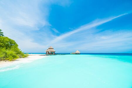 Beautiful tropical Maldives resort hotel and island with beach and sea on sky for holiday vacation background concept - Boost up color Processingのeditorial素材
