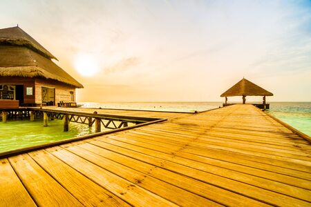 Beautiful tropical Maldives resort hotel and island with beach and sea on sky for holiday vacation background concept - Boost up color Processing and Vintage Filterのeditorial素材