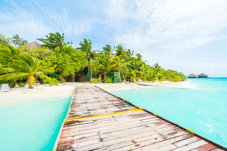 Beautiful tropical Maldives resort hotel and island with beach and sea on sky for holiday vacation...
