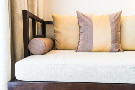 Beautiful comfort pillow on sofa decoration in living area interior - Vintage light Filterの写真素材