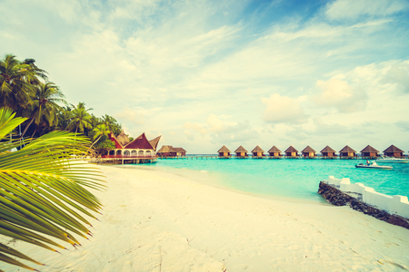 Beautiful tropical Maldives island with beach and sea for nature holiday vacation background concept - Vintage Filter and Boost up color Processingのeditorial素材