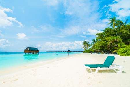 Beautiful tropical beach and sea with coconut palm tree on blue sky in Maldives island - Boost up color Processingのeditorial素材