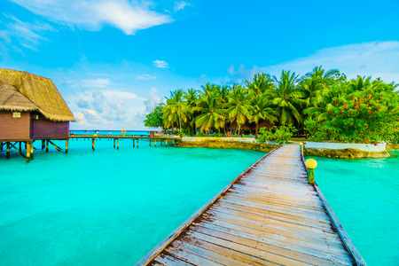 Beautiful tropical Maldives resort hotel and island with beach and sea on sky for holiday vacation...